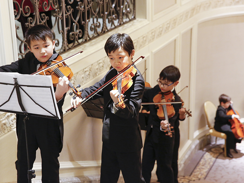 Chicago Youth Symphony Orchestra's Preparatory Strings perform during the gala (Credit: Mila Samokhina).