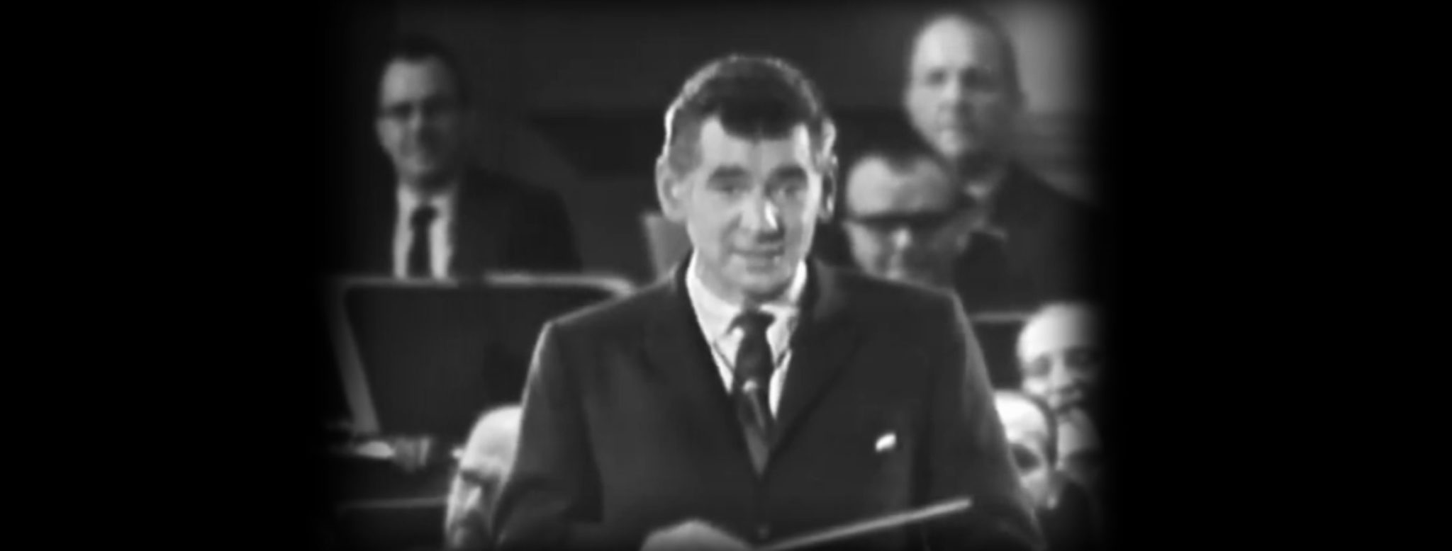 Leonard Bernstein speaks to the audience in the Young People's Concert titled "Humor in Music." (Credit: Leonard Bernstein Office, Inc.)