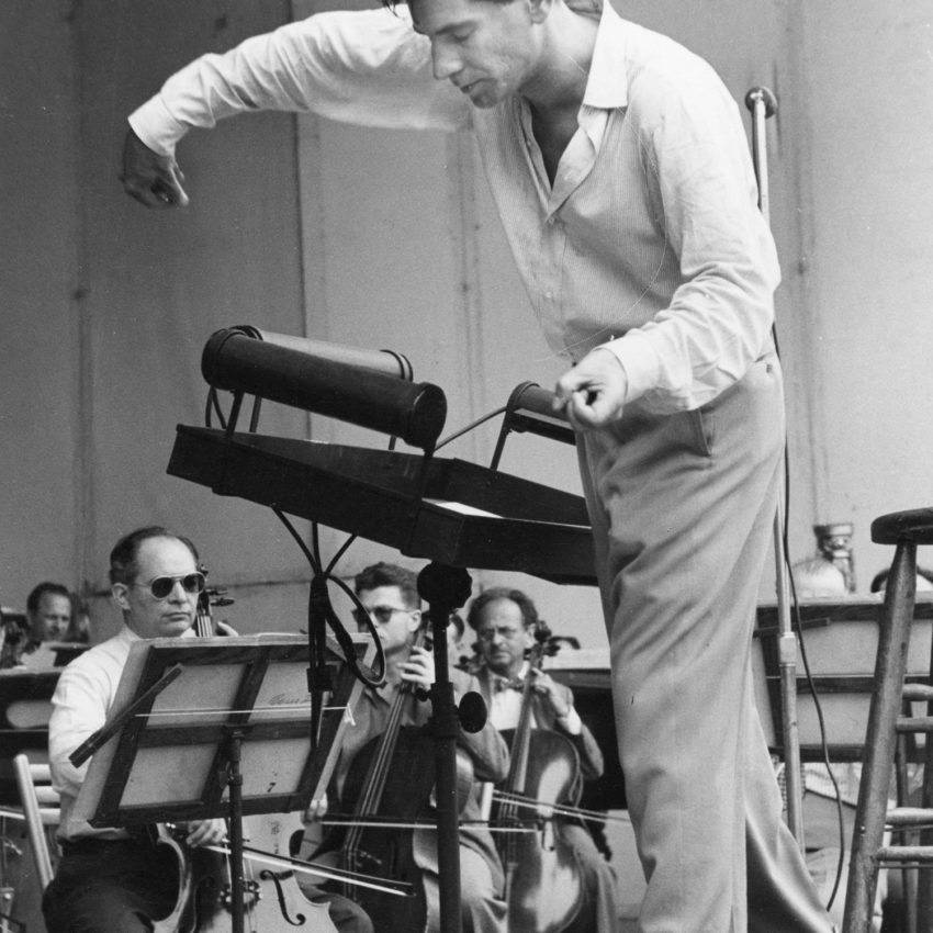 Conducting at Lewisohn Stadium (1957). (Copyright: Ruth Orkin Photo Archive. Used by permission, courtesy of Mary Engel. All rights reserved.)