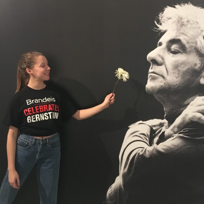 A Brandeis student at the Power of Music exhibit. (Credit: Brandeis University Office of the Arts)